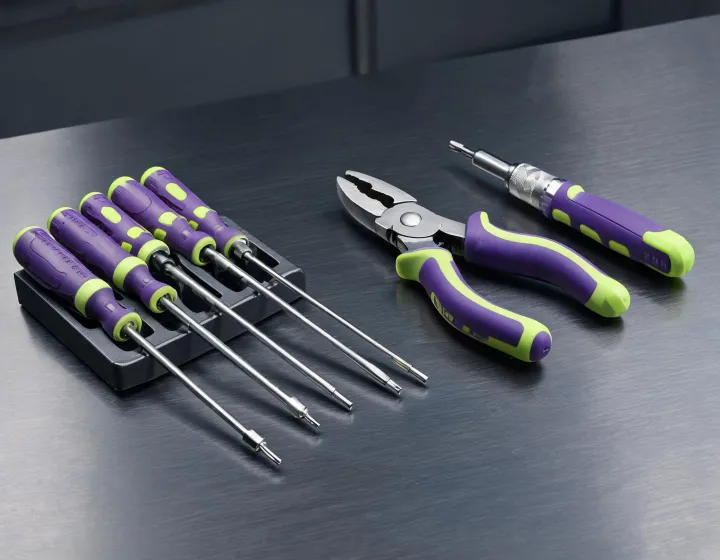 Wiha hand tools arranged on a steel workbench